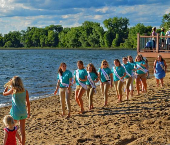 Last year’s Watercade Royalty candidates — from left, Hannah Schacherer, Maddy Larson, Courtney Smith, Amanda Buck, Maddie Grates, Kristina-Marie Christopherson, Morgan Randt and Brianna Larson — along with 2016 Princess Justine Madsen and 2016 Miss Litchfield Hailey Stoffer busted a move in the “Cha Cha Slide” by DJ Casper during the Beach Party at Lake Ripley.