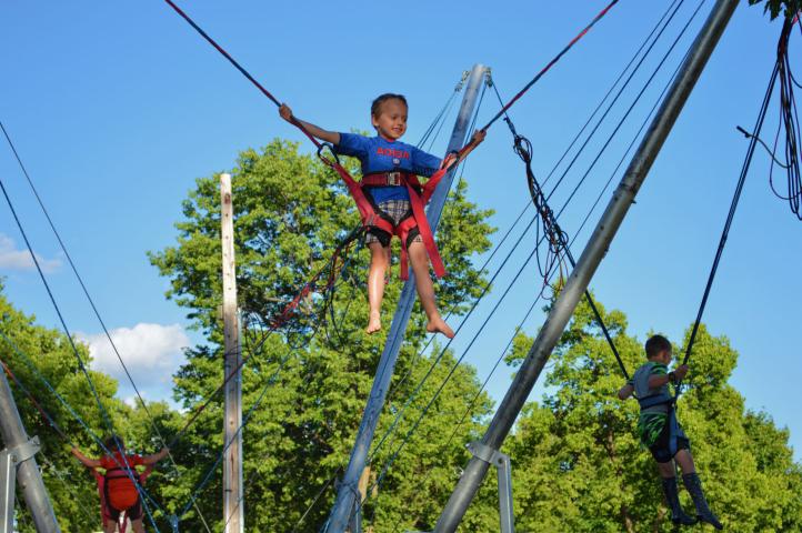 Jackson Wiechmann jumped for joy on a trampoline at the Watercade Beach Party at Memorial Park July 7.