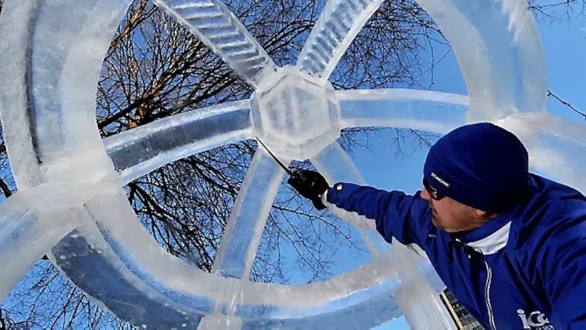 Chris Swarbrick of Richfield cleans up an ice sphere, part of his team’s entry, “Fountain of the Unicorns,” at Rice Park in St. Paul on Friday January 23, 2008. Judging for the Winter Carnival ice carving competiton takes place at the park on Saturday morning. (Pioneer Press: Richard Marshall)