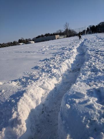 David Briese shows the path he was digging from Ramsey Park’s north entrance south to the fence of the ball diamond.