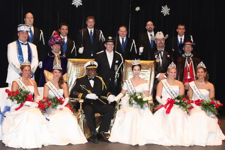 Troy Natus, pictured second row, far left, as Titan, Prince of the North Wind, with the rest of the 2010 St. Paul Winter Carnival royal family shortly after coronation. (Courtesy photo)